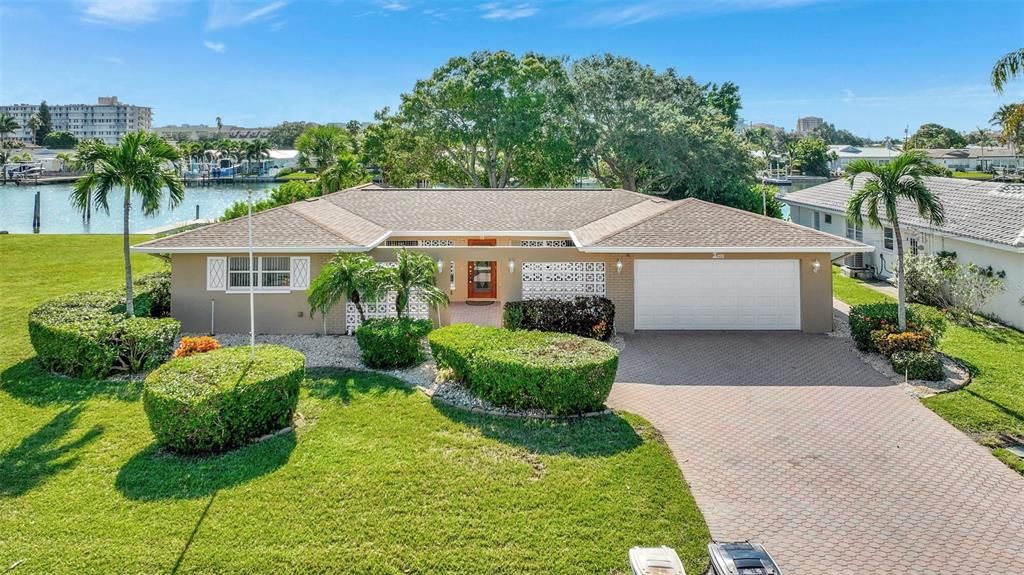 Welcome to 400 Midway Island, with a spacious driveway and 2 car garage and what a view!!!