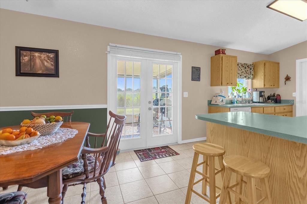 Kitchen and Dining, French Doors to Covered Patio