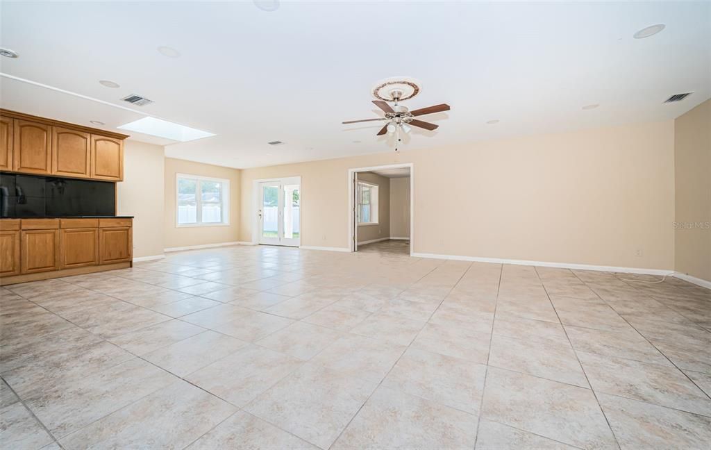 Bright Great room with skylight and dry bar