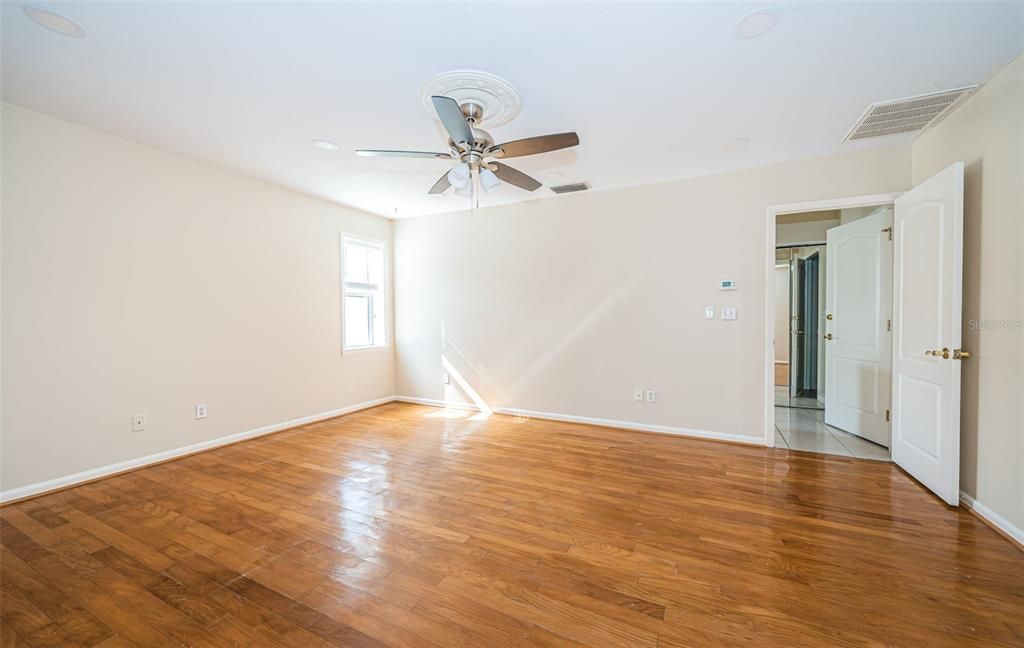 Primary Bedroom with entrance to En Suite and Walk In Closet area