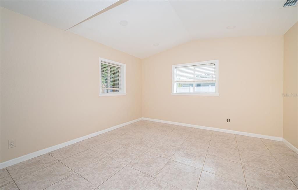 Bedroom 3 with En Suite bathroom and lots of privacy toward back of home