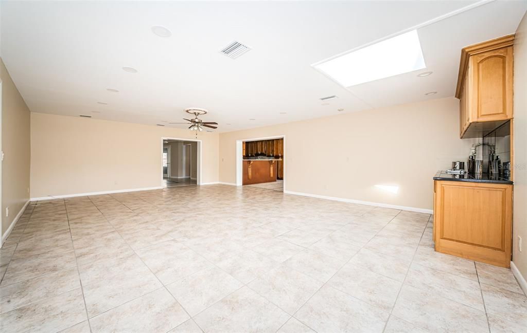 Dining Room/Family Room with view of Wine Room door on right