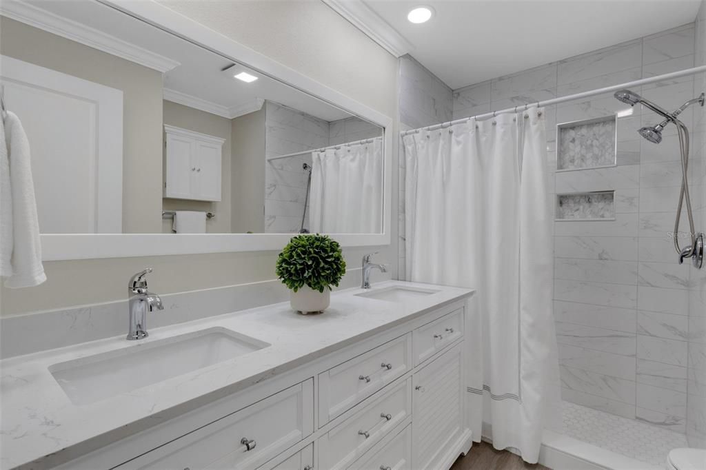 Remodeled en-suite with dual sinks, tile walk-in shower & new lighting~