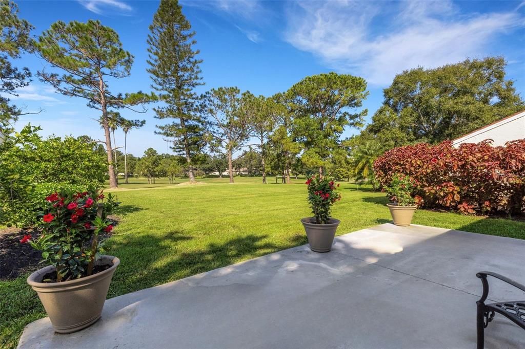 Large back patio with relaxing and peaceful golf views~