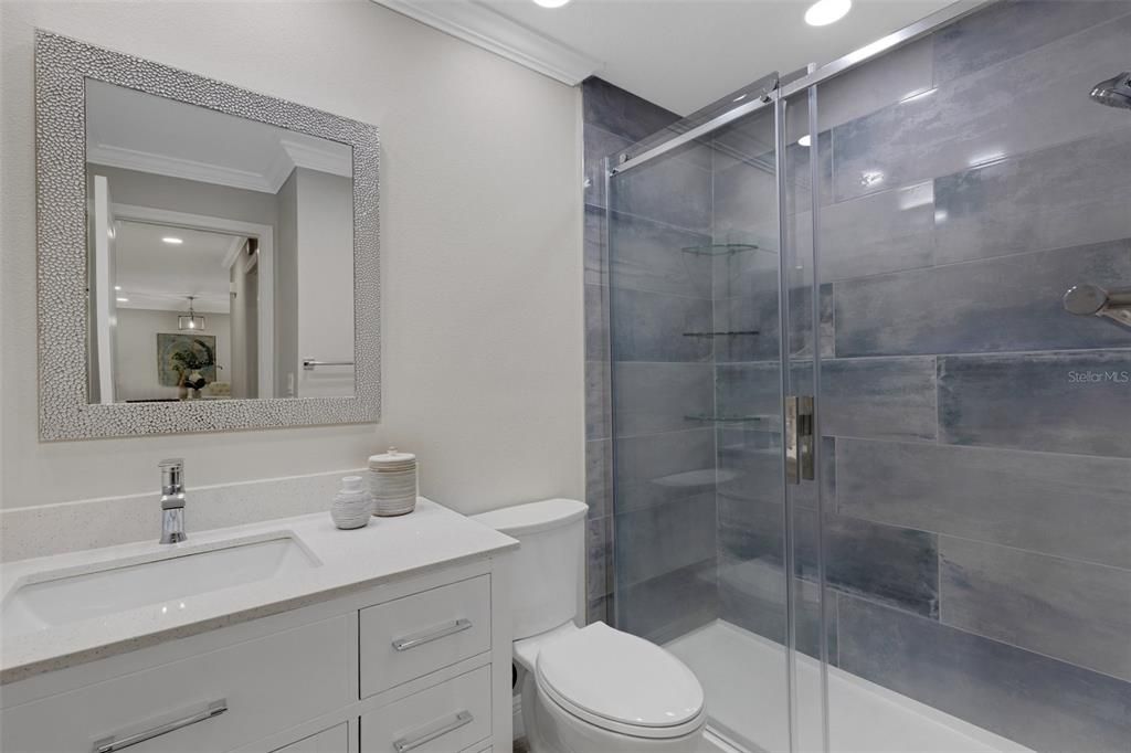 Front hall bath updated with tile walk-in shower, quartz countertops & updated lighting~