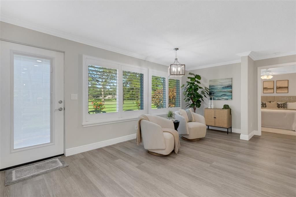 The original sunroom was fully enclosed to be included in living square footage and now a wonderful flex space~