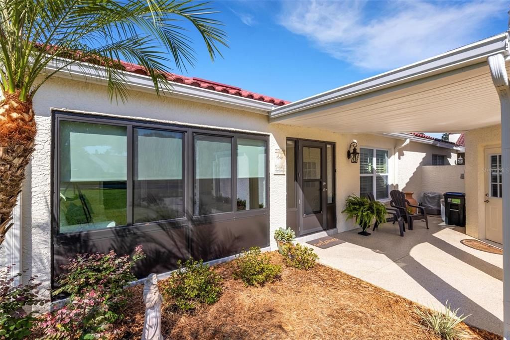 Covered breezeway connecting the sunroom & garage~