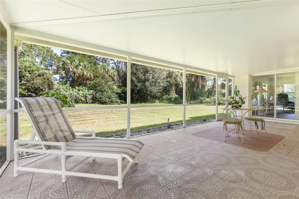 Huge tiled cover and screen Lanai.