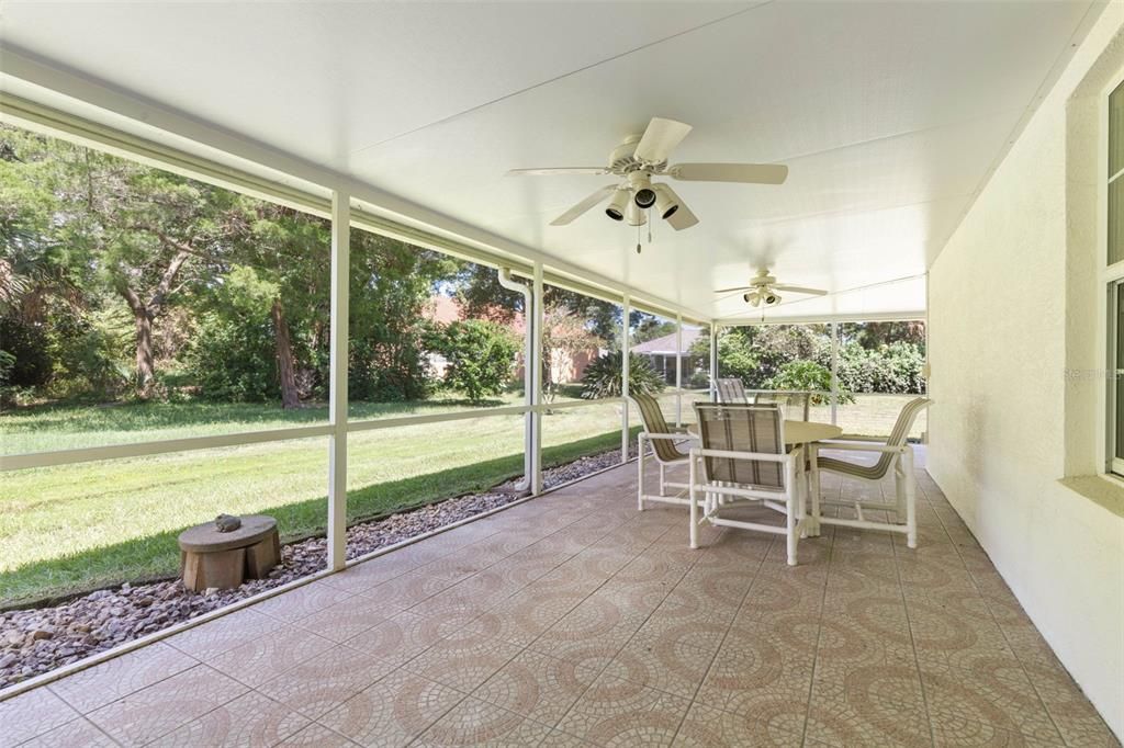 Huge tiled cover and screen Lanai.