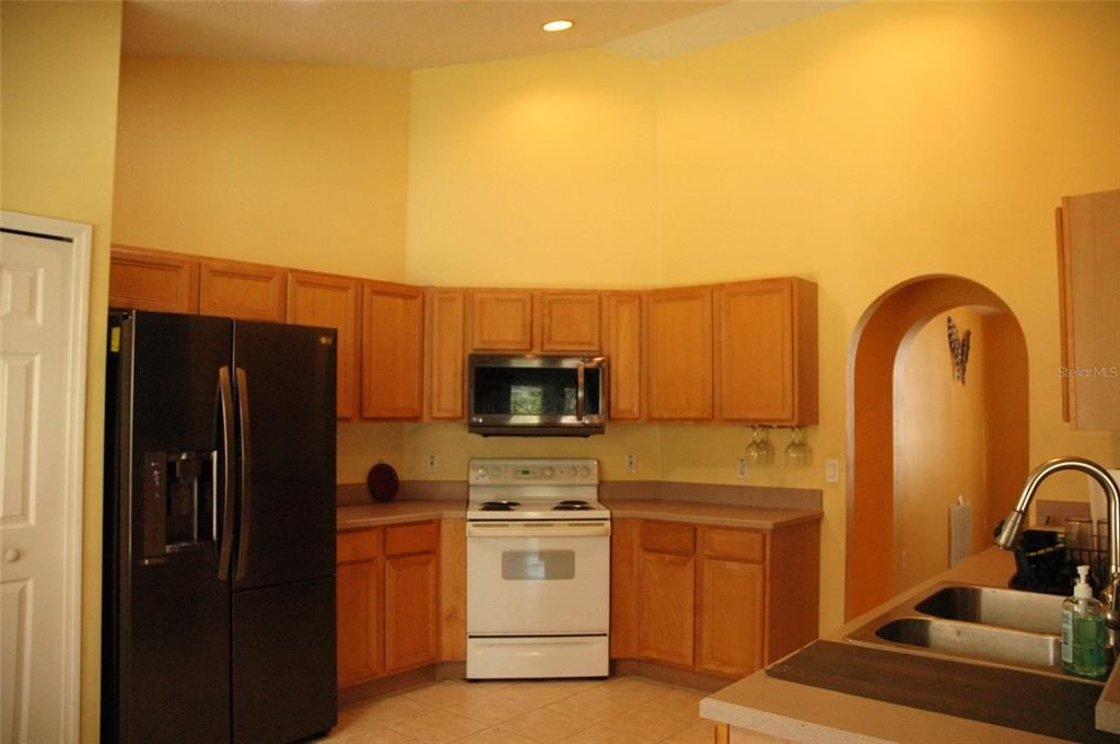 Great size kitchen with light wood cabinets