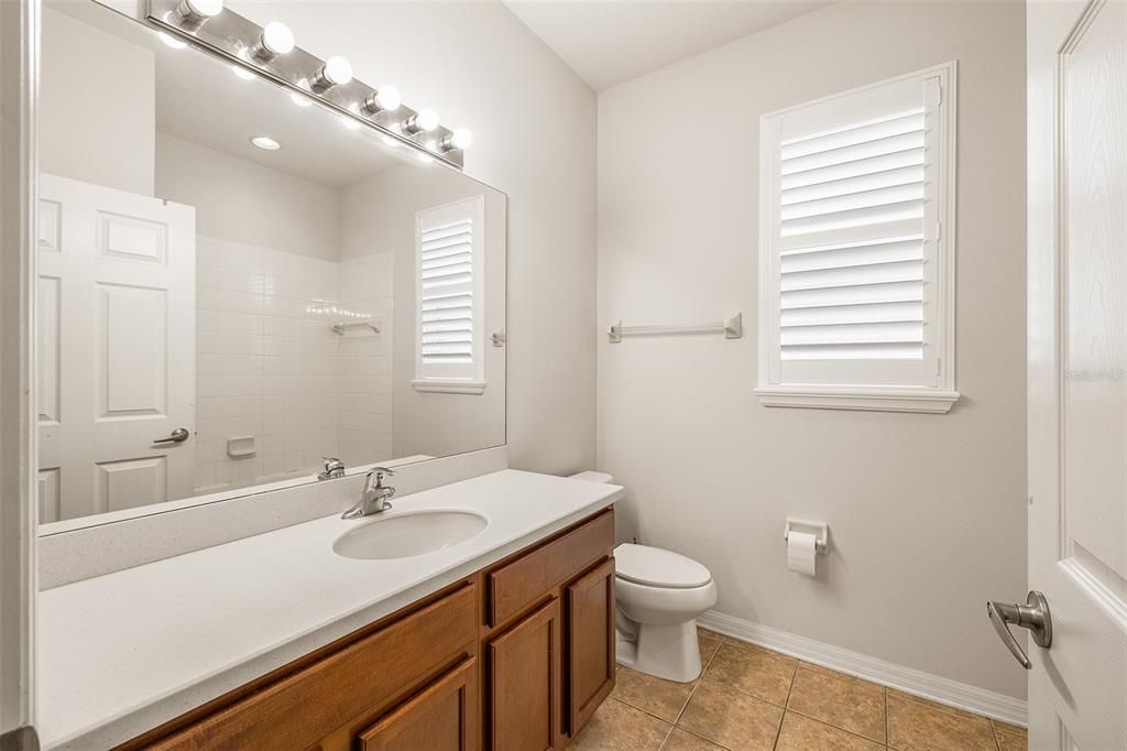 Full Guest Bathroom with Tub is so perfectly placed between Bedrooms