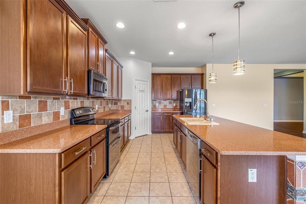 Kitchen with 42" Cabinets adorned with Crown Molding!