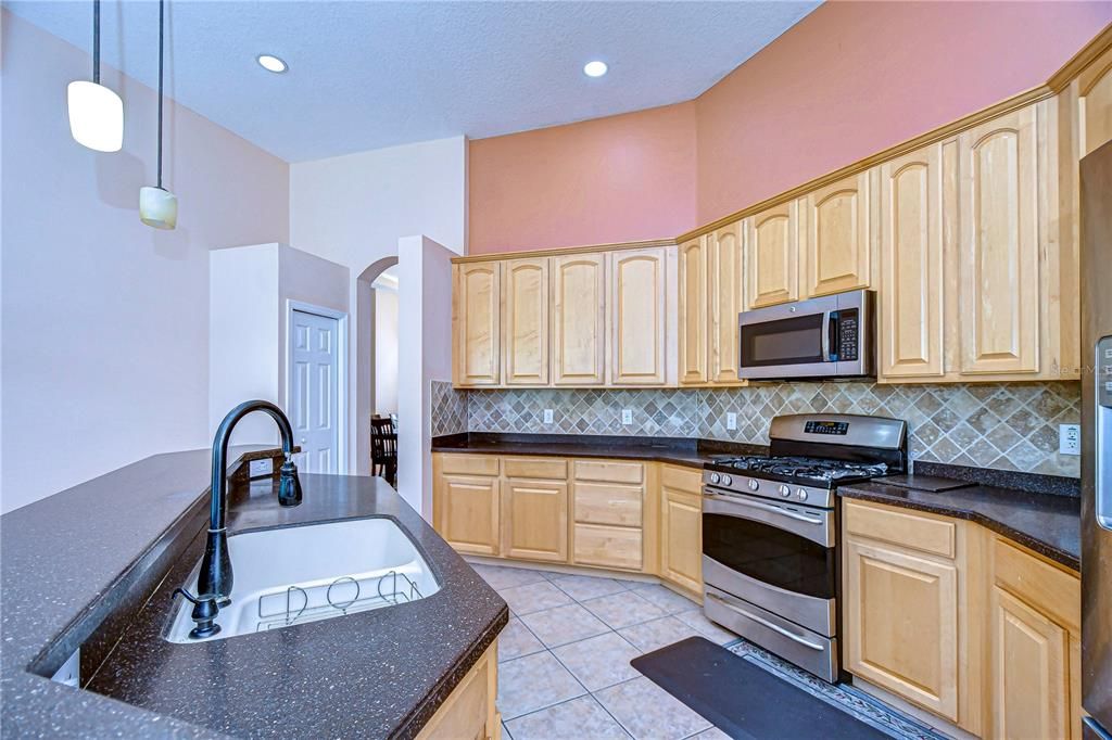 Stainless steel appliances, including a new dishwasher and 42-inch wood cabinetry!