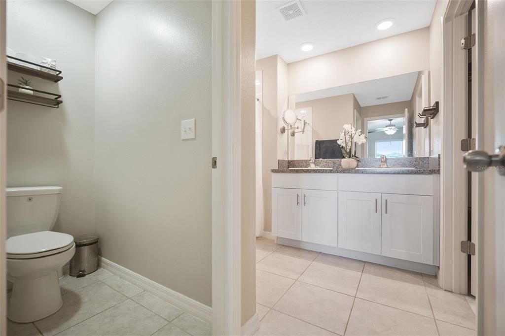 Primary Suite bathroom with separate water closet.