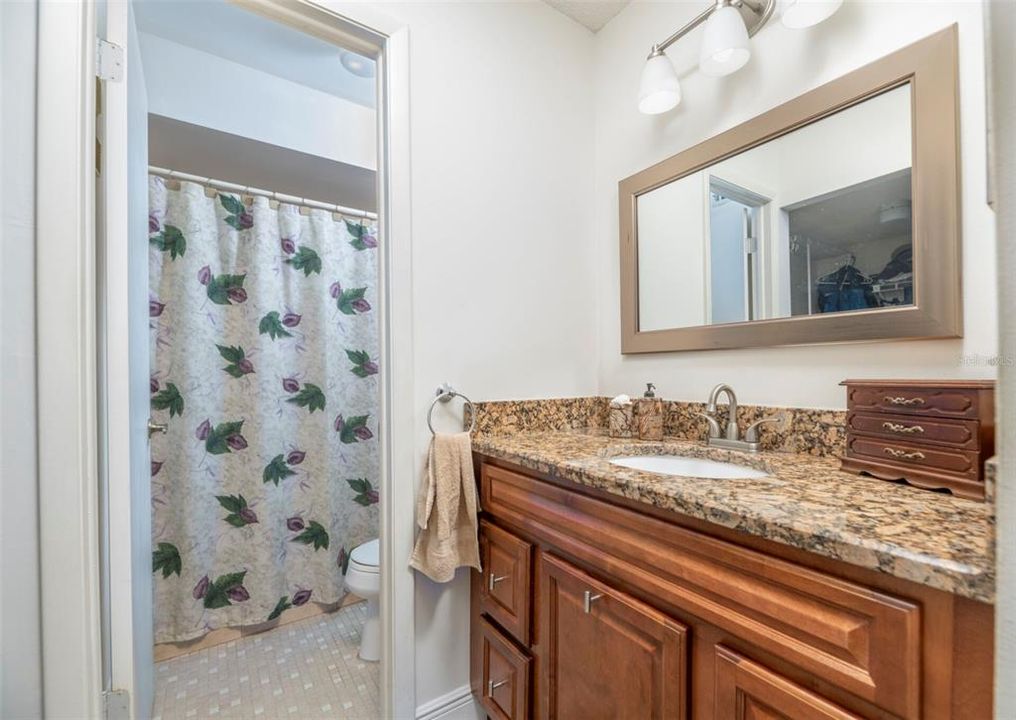 Shower and toilet in separate space for privacy.