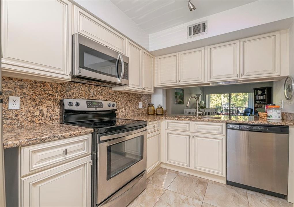 Stunning remodeled kitchen with Solid Wood Cabinets and Stainless  Steel Appliances.