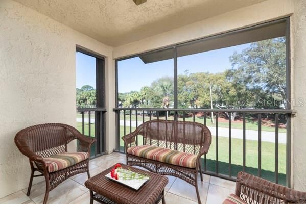 Covered screened patio to relax on. There is an outdoor closet for more storage.