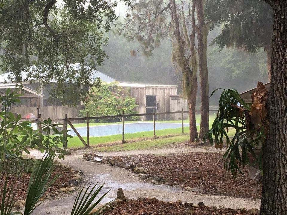 summer rains view from main house front porch