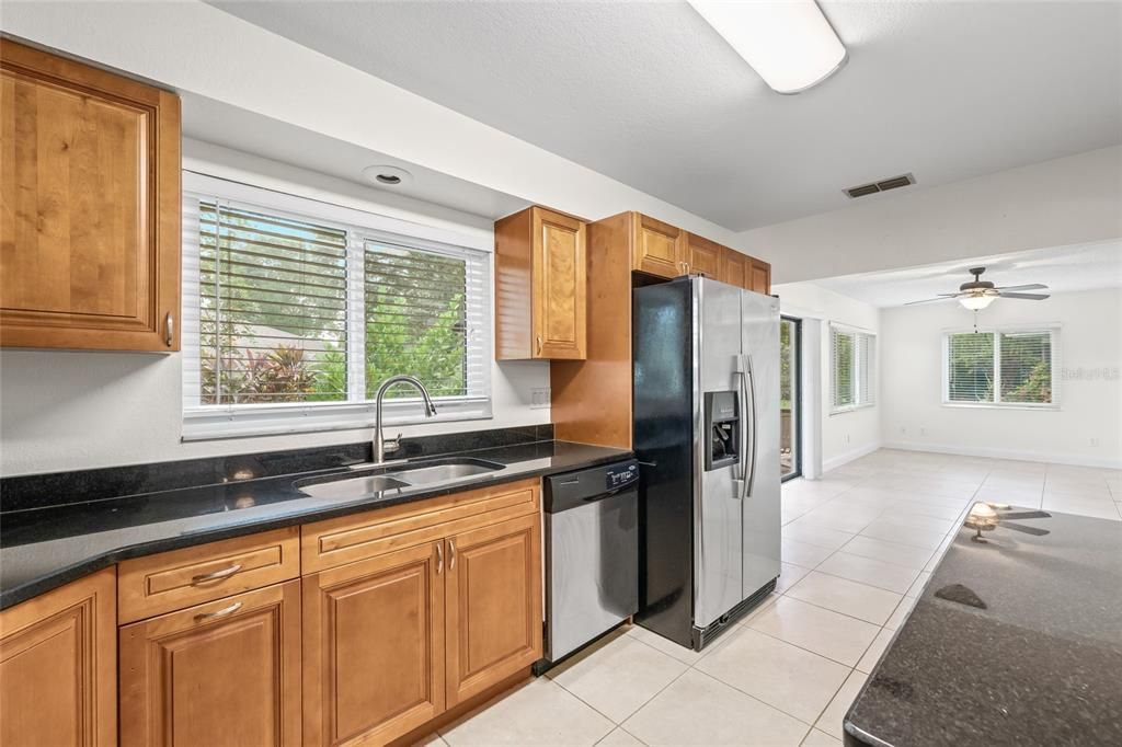 Kitchen leads into a 2nd living space