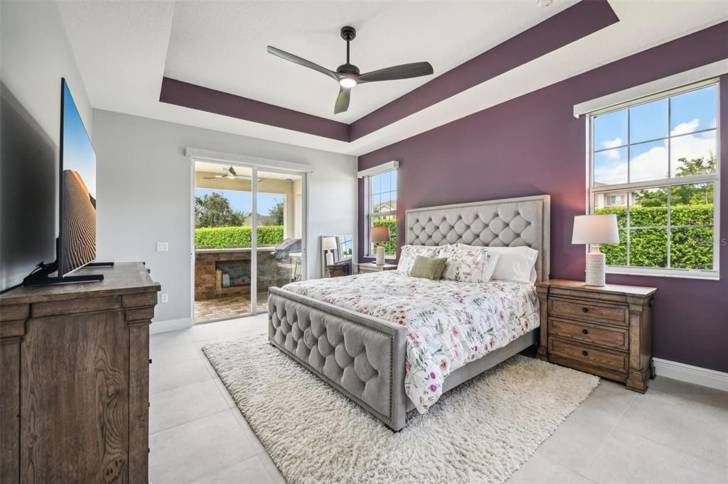 The ideal 3-way SPLIT BEDROOM floor plan invites the owner to enjoy an exclusive retreat in the PRIMARY SUITE featuring a lovely tray ceiling, its own access to the lanai/pool, new flooring, DUAL WALK-IN CLOSETS and a must see en-suite bath.