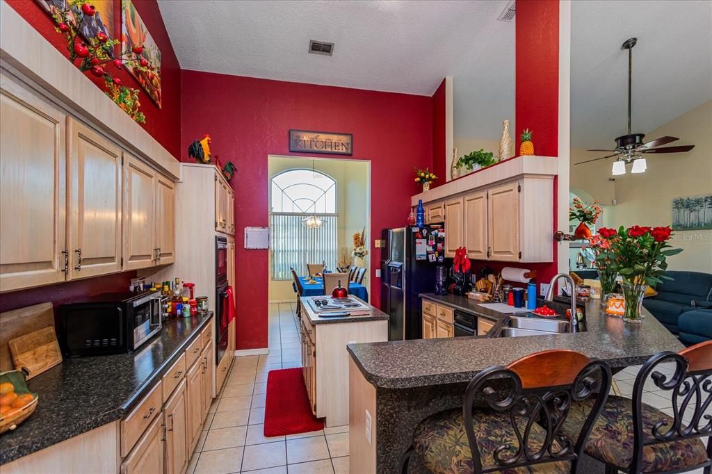 Spacious Kitchen with Island cooktop.