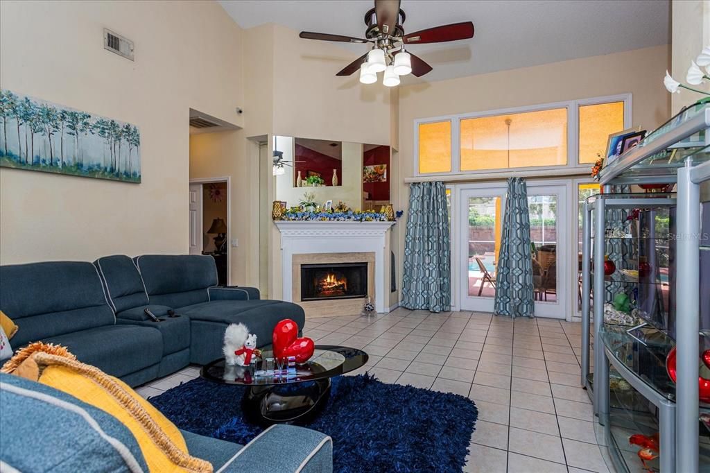 Huge Family Room with Wood Burning Fireplace.