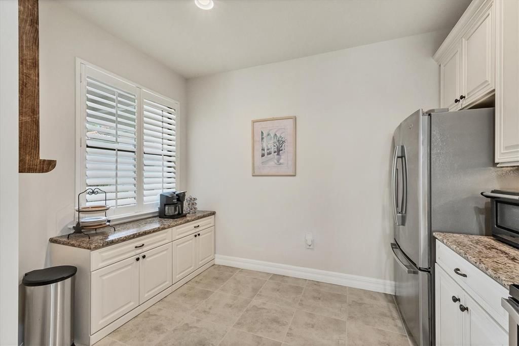 Kitchen - extra cabinetry that is perfect for setting up a coffee bar