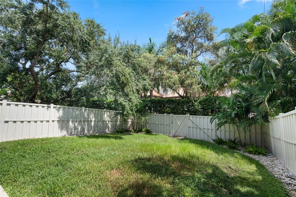 Private backyard with vinyl fence