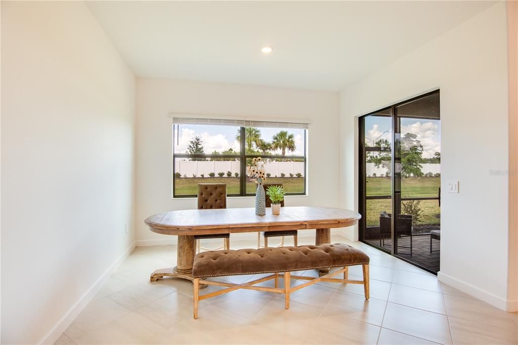 Dinning/Eat in Kitchen with sliders to the cover lanai