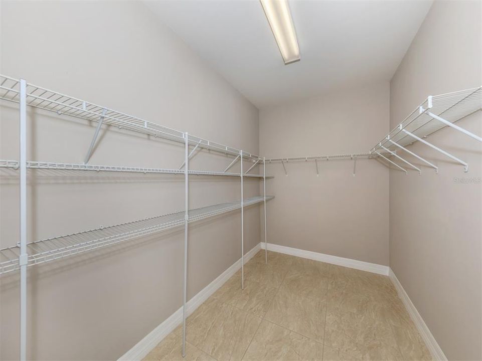 The large master closet is perfect for two!