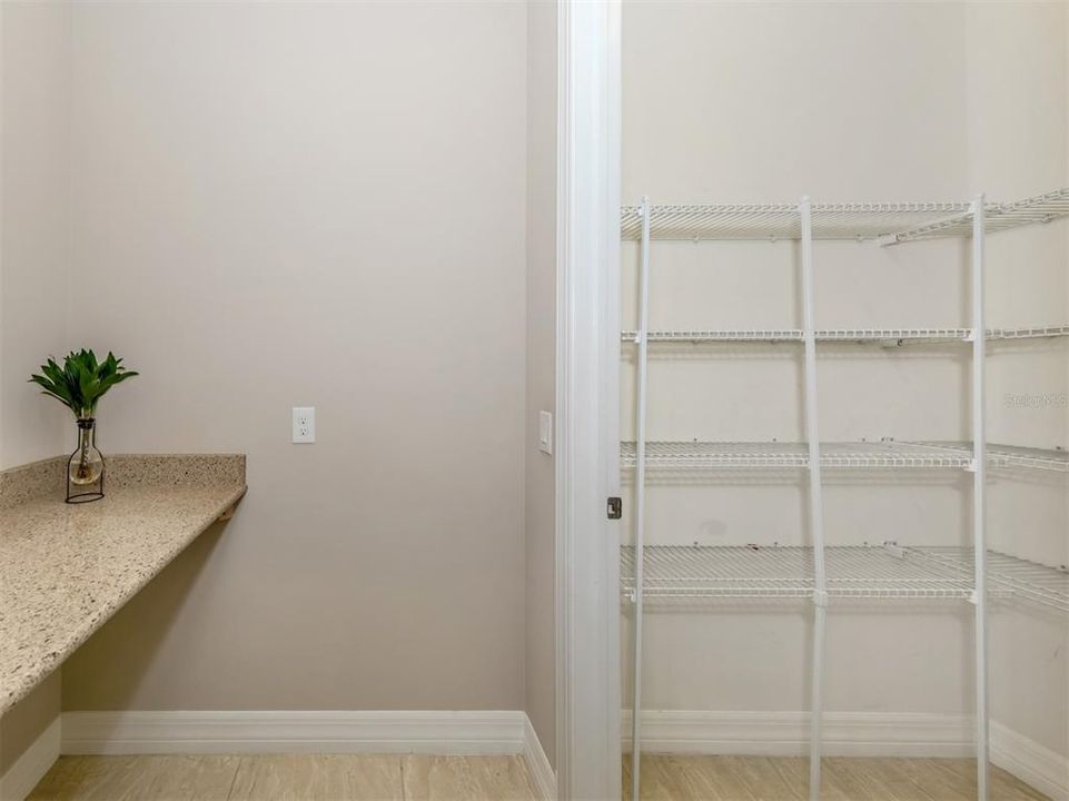 The butlers pantry and large walk in pantry completes this amazing kitchen