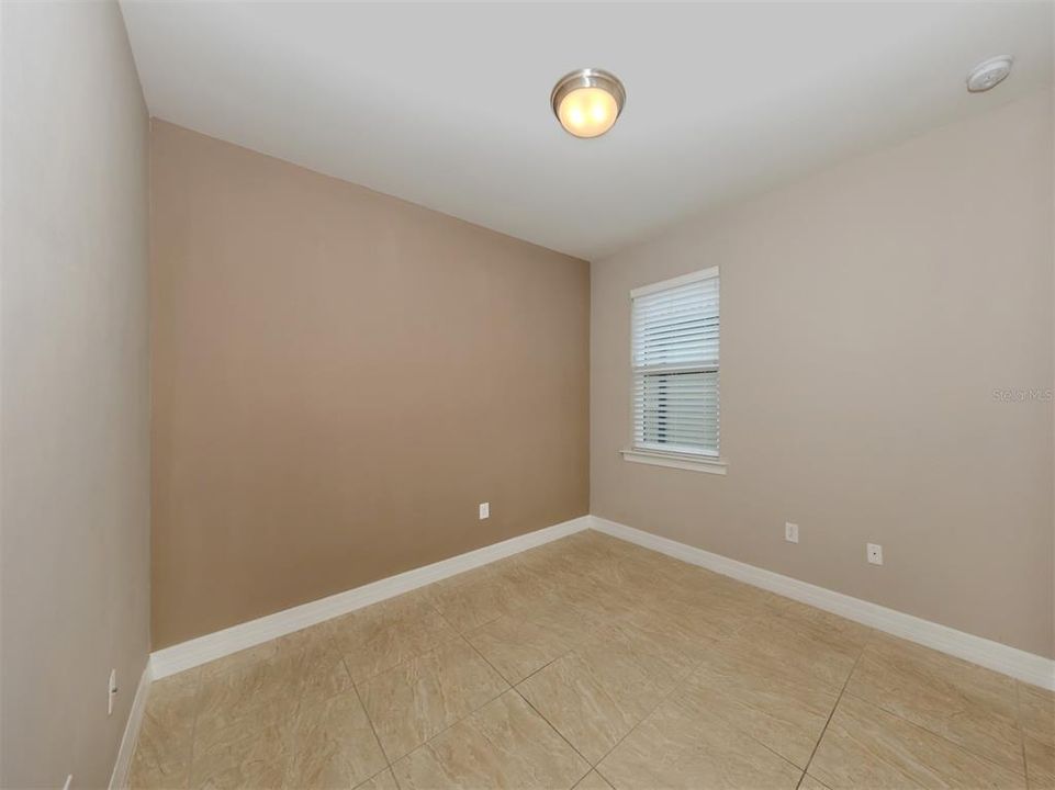 The second bedroom features its own closet and near the second full bath