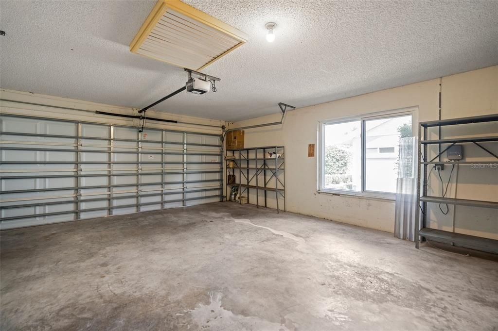 Double car garage with wok bench and storage