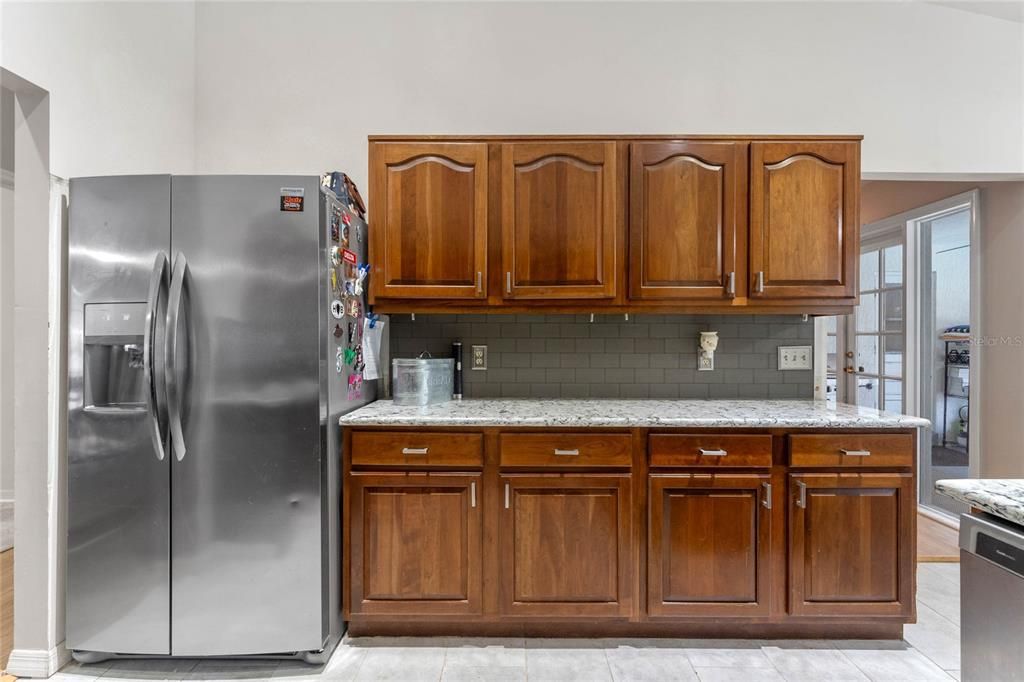 Kitchen with granite counters & stainless steel appliances