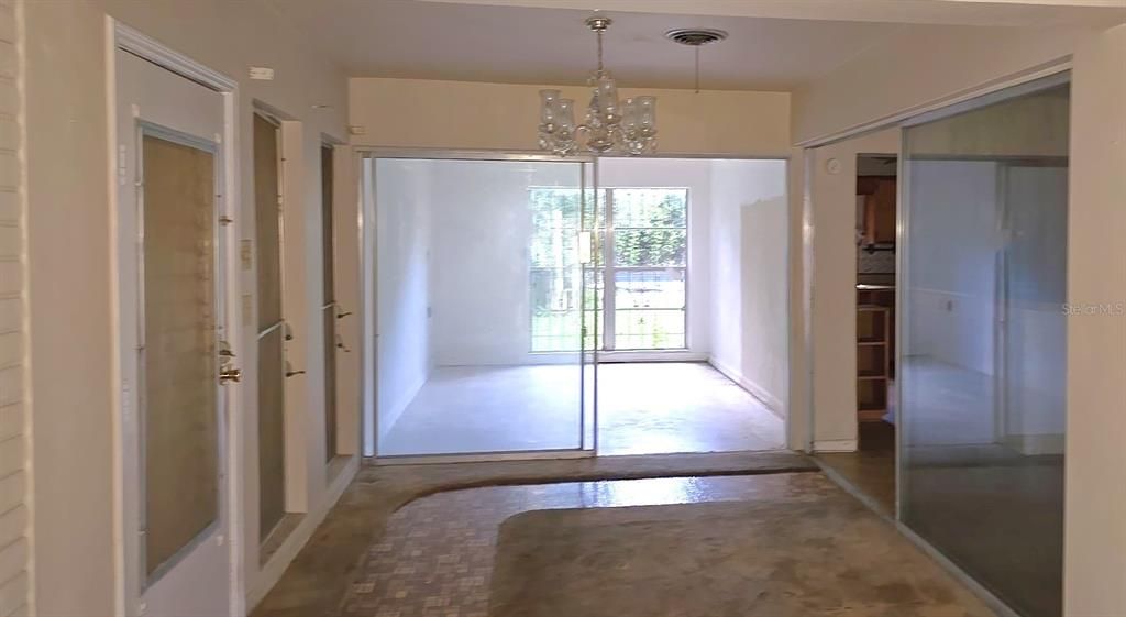 Seperate dining area with garage entry door to the left.