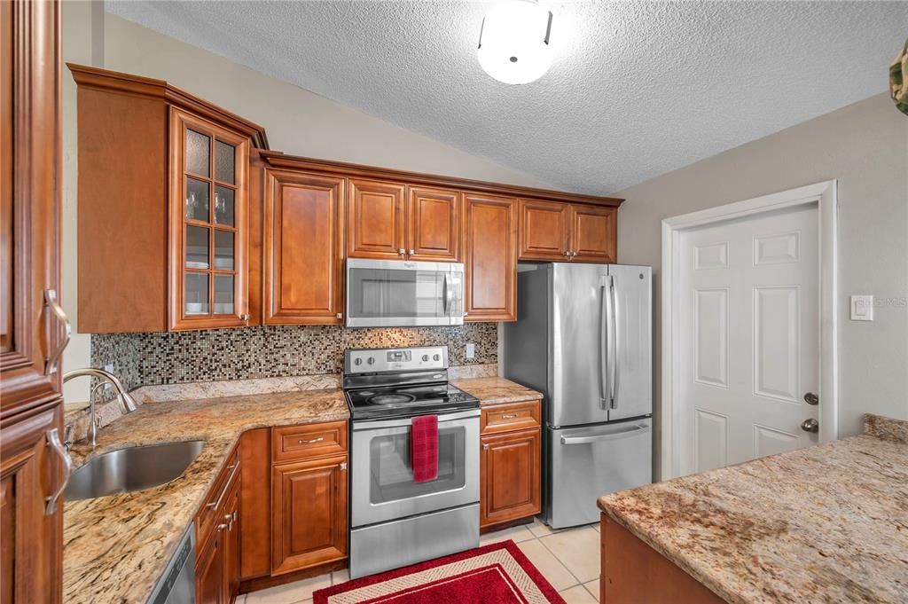 Beautiful Kitchen with Door to Garage