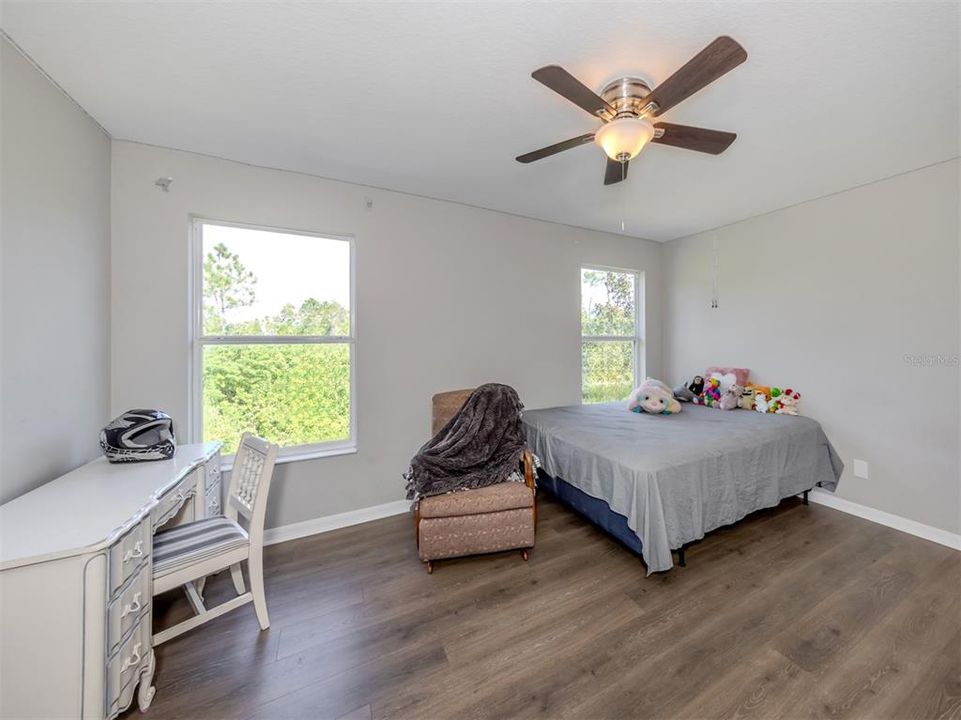 Bedroom three is large and includes a walk in closet and shares the Jack and Jill bath