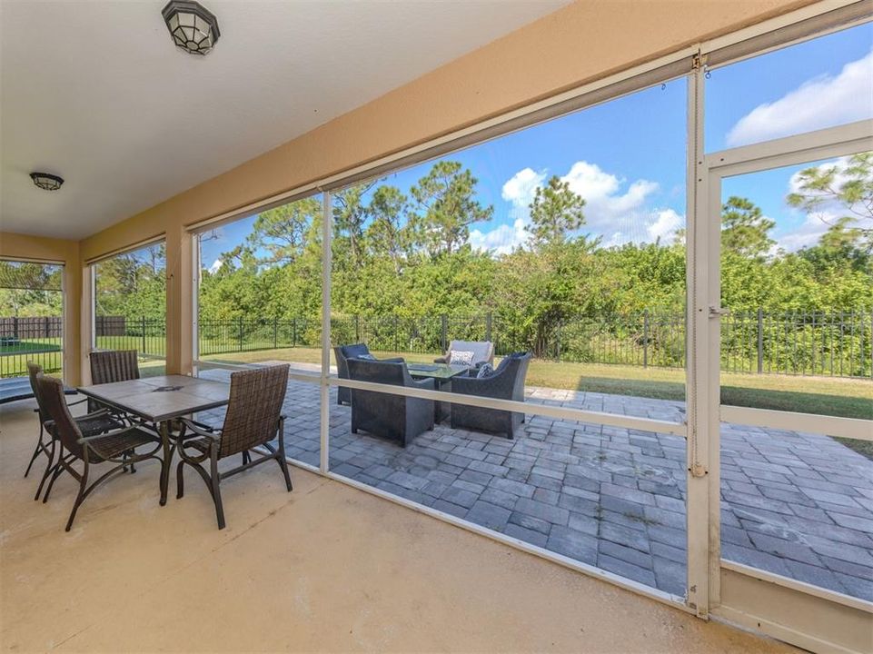 The lanai is spacious and overlooks a beautiful preserve