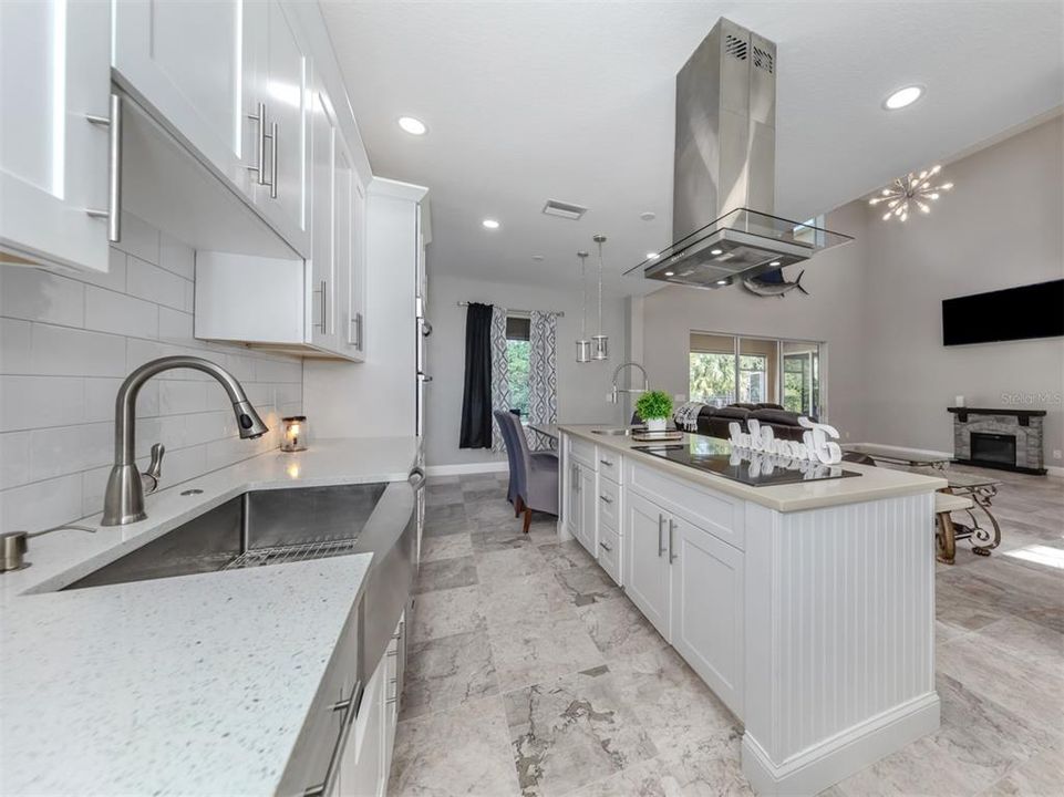 This beautiful kitchen is open to the great room so that everyone can chat with the chef during those special meals