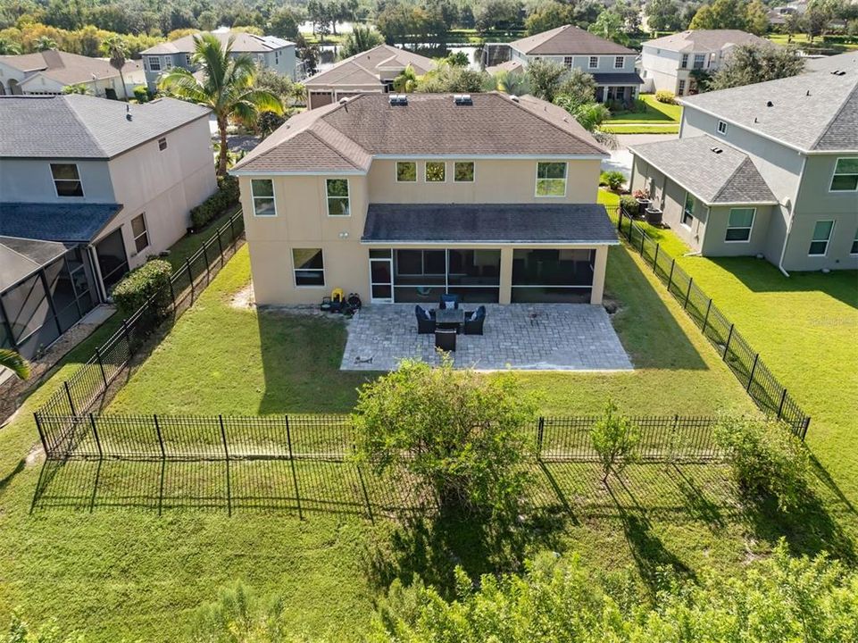 This large fenced in back yard has plenty of room for a pool to be installed