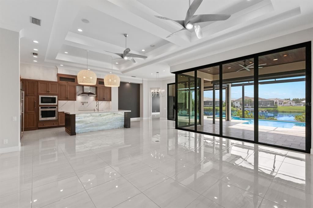 Living room with wall of sliding glass doors