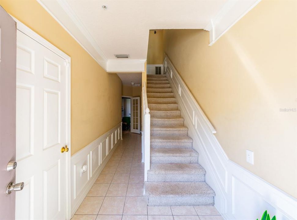 View From Front Entrance. Hallway to Ground Floor Bedroom, Half Bath and Stairs