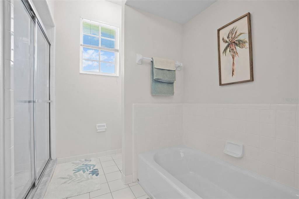 Primary Bathroom with dual sinks, soaking tub & Walkin Shower