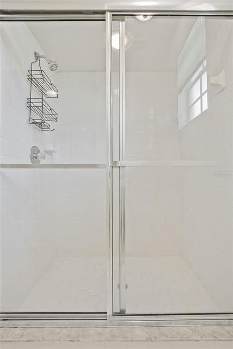 Primary Bathroom with dual sinks, soaking tub & Walkin Shower