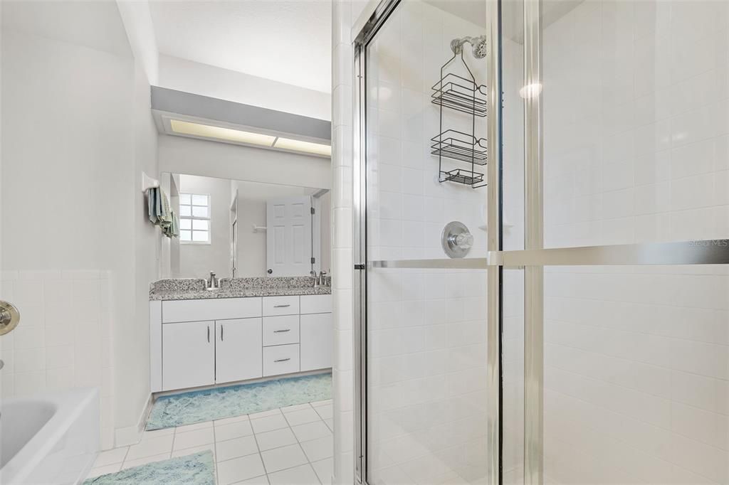 Primary Bathroom with dual sinks, soaking tub & Walkin Shower