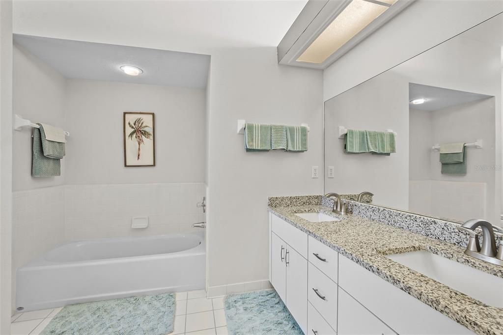 Primary Bathroom with dual sinks, soaking tub & Walkin Shower