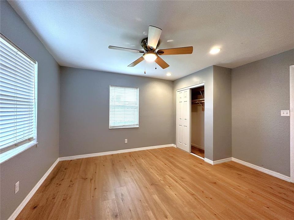 Primary Bedroom with built in closet and en-suite bathroom