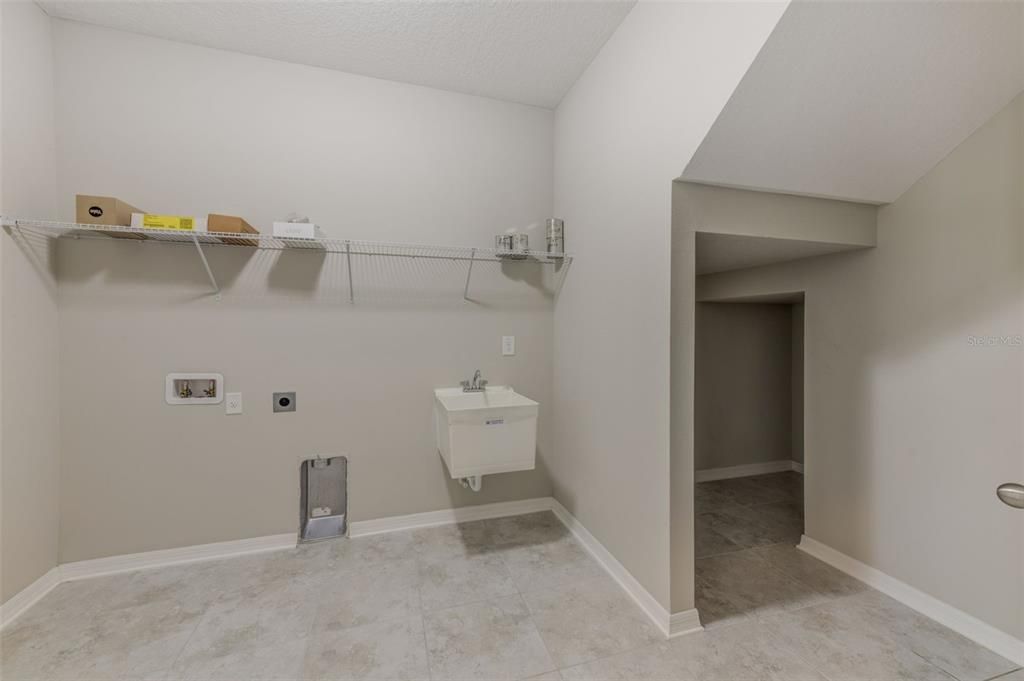 Laundry Room with under stair storage