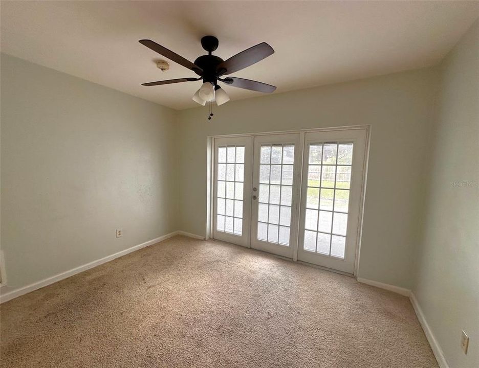 Dining Room with french doors leading to the back yard