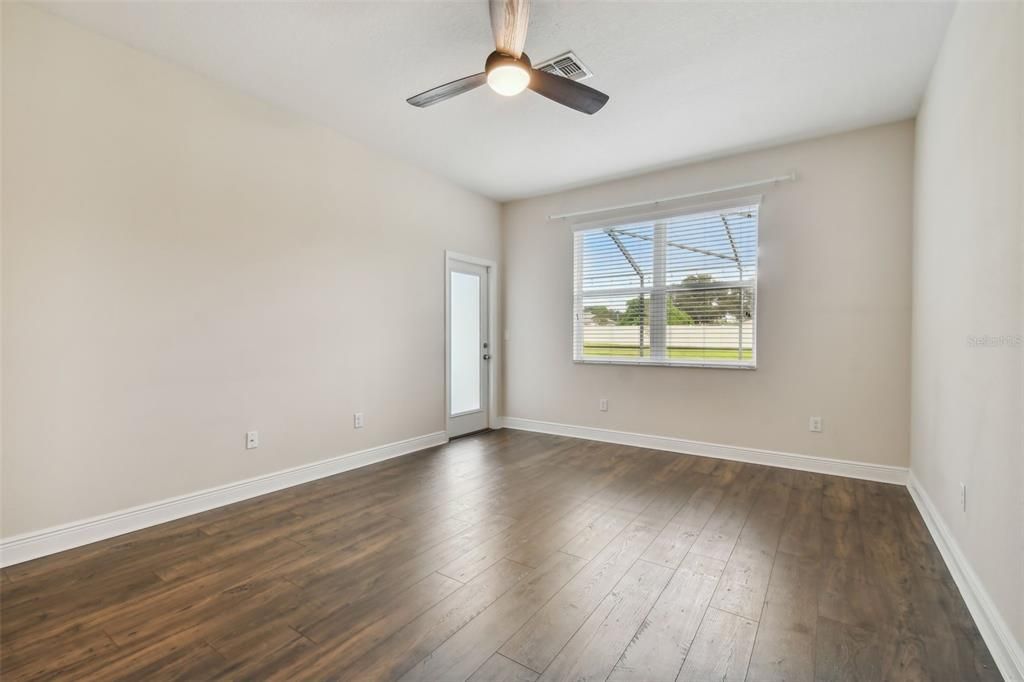 Primary Bedroom with door leading to the Lania